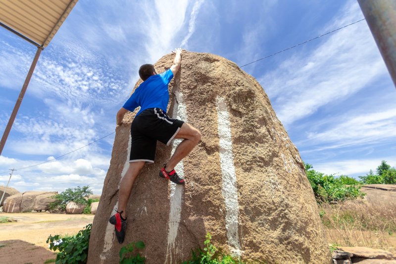 Nate stretching for the Commendable Hiccuping Dyno...a short distance but awfully reachy with such bad holds.