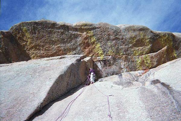 At the anchors of E.O. Friction. E.O. Leiback climbs the flake just to the left of the rope.
