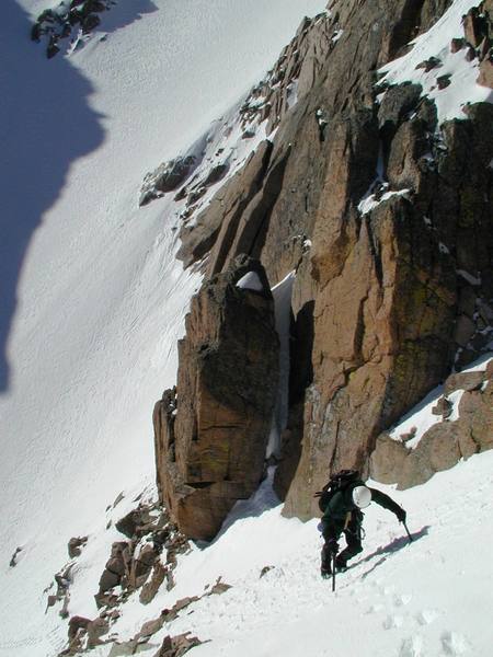 Rodger Poage on the exposed traverse onto Broadway from Lamb's Slide, May 2000. Photographer: Paul Crowder.