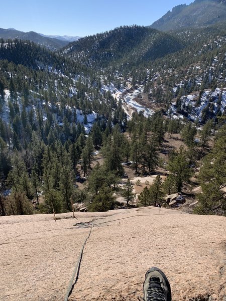 Sally's near the third bolt. Getting to the highest two gear placements (green Alien pushed deep into fragile rock, and a #2 Stopper in fragile crack) involved a long runout on 5.5 slab.