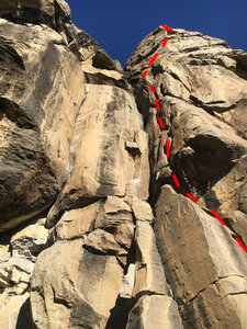 Looking at climb from the ground up. Chalked finger crack to left is 'Flirting with Disaster' 5.10