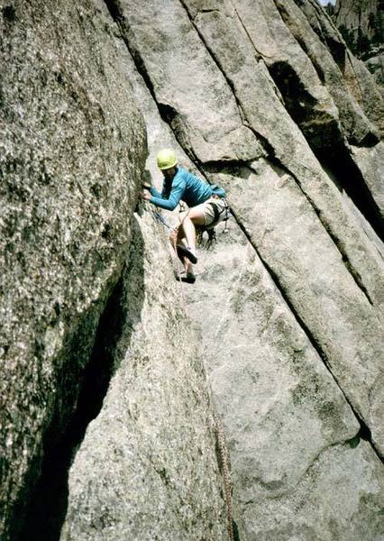 Isn't this the traverse pitch mentioned? Steven Gale follows the right-hand traverse in 1995. Photo by Tony Bubb
