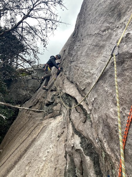 Start of second pitch, this is the traverse out left then go up near where climber is in the pic.