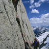 Sue McCowen leading off of Surf's Up. Guy Johnson belaying - July 1990