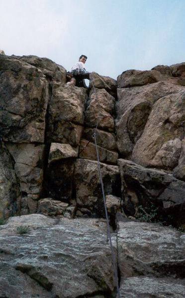 Mark Speiker Leads the crux roof of West Overhang on Eldo's Wind Tower. Photo by Tony Bubb.