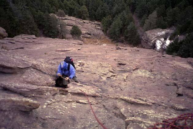 Roger Wilkerson about 400' up. No waiting when its 40 degrees out. Photo by Kevin Currigan. Dec. 9, 2001.