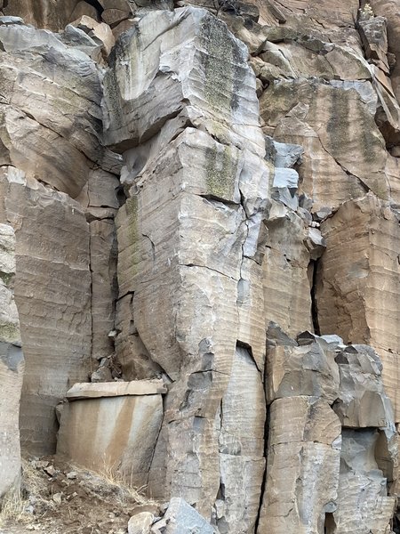 Hard as a Really Hard Thing climbs the left side arete of the pillar.