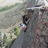 Kara Chrysler cruising to the crux August 31, 2001.  Photo by Kevin Currigan