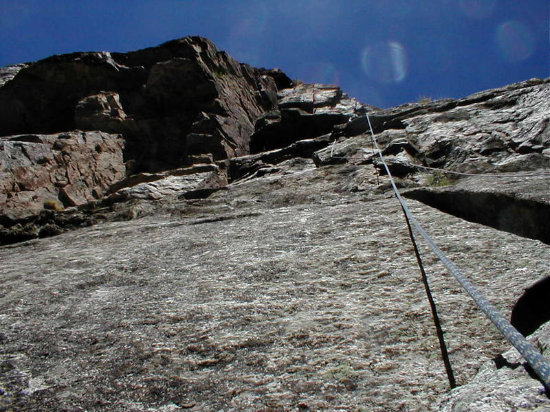 Boots on the crux roof pitch. Photos Taken May 31, 2001.