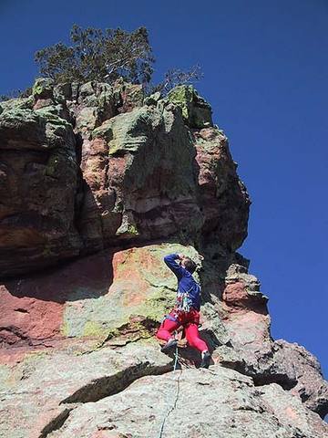 Bill Wright checks out the variation on pitch 5 of the East Ridge. At this point the regular route traverses up and right.