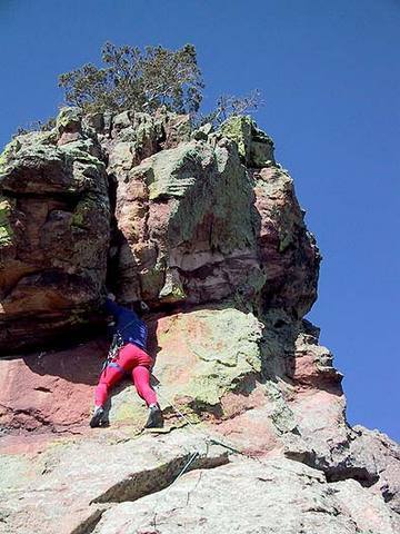 Bill Wright starting the crux of the variation to pitch 5, East Ridge of the Maiden.