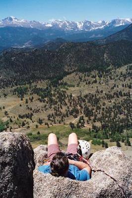 Janet relaxing in the rockalounger at the top of Osiris. This perfectly (depending on butt size) dished out rock seat even has a hole in the bottom for your chalk bag!