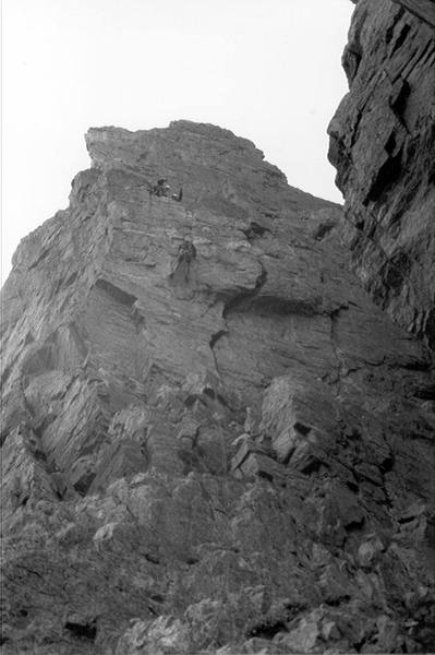 Lon Black rappelling off the Petit after we were rained off at the sixth pitch.