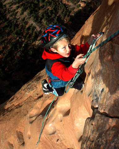 You think you're tough. Here's Zane, age 5 or 6, finishing up the final overhang (with a little aid).
