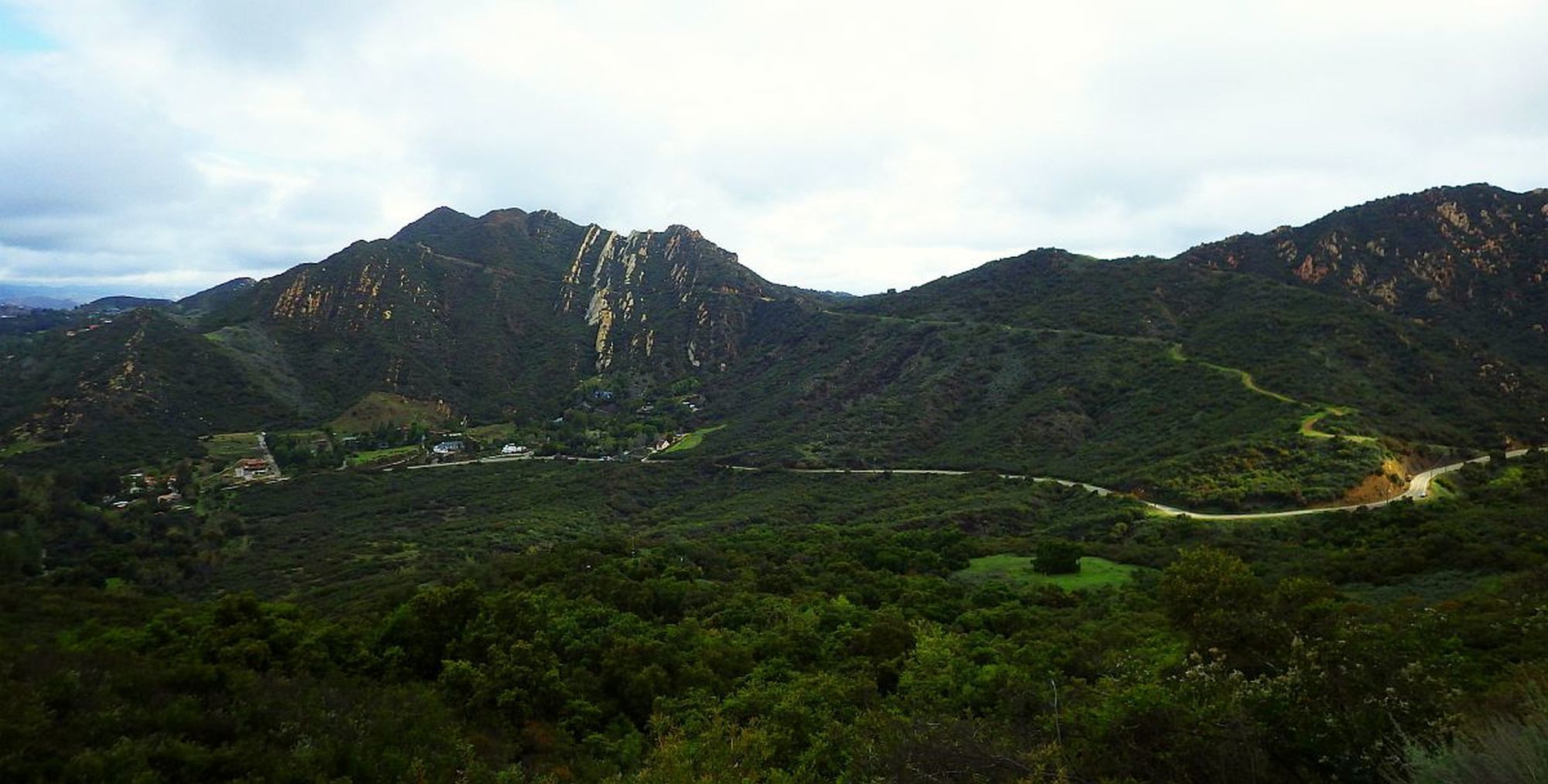 Calabasas Peak, with the prominent rocky fins partway up. Trailhead