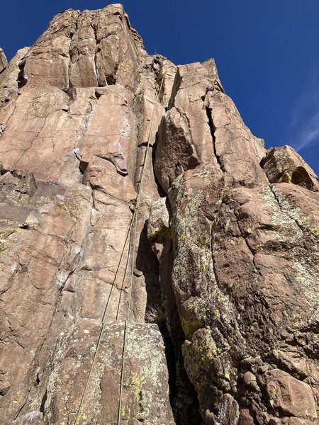 The climb is the crack to the left of the rope.