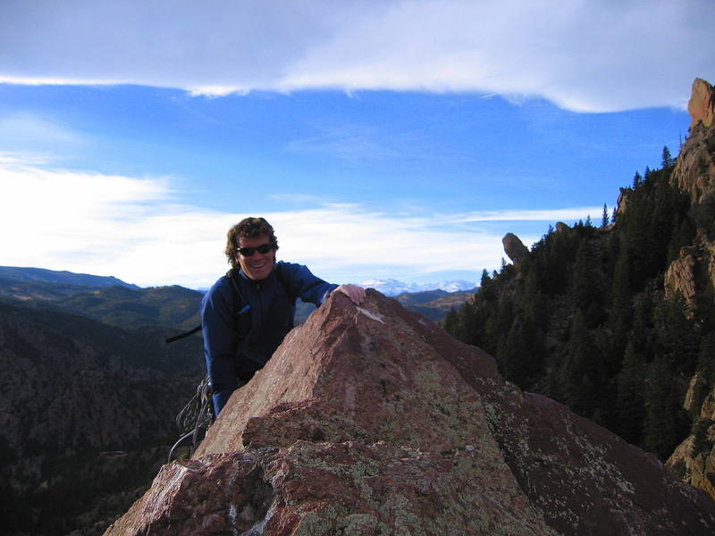 Chris Carithers tops out on Yellow Spur. Photo: Mike Morley.