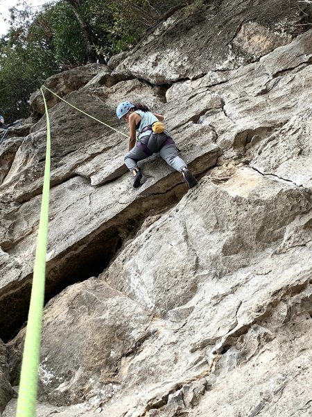 Guide's Wall TR with anchor and rope pad attached to the middle set of old bolt anchors (climber Abigail Hendrie)