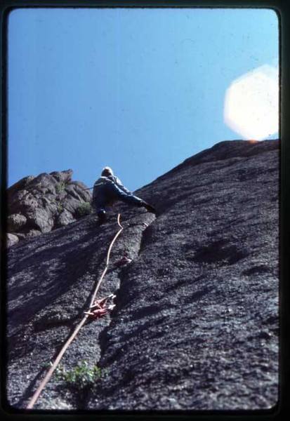 This picture was taken on the first ascent in June '81. Note the Levi's and no harness, just the 2" swami. Footwear by EB....<br>
Photo: Bill Wylie