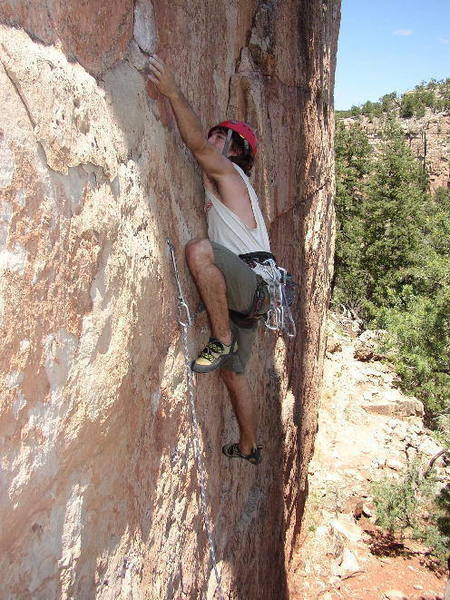 Making the stretch on The Needle Lies first bolt