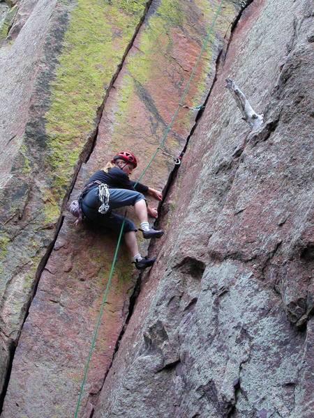 Christa Cline laybacking the crux of the first pitch.