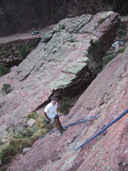John "hanging out" at the second belay, Whale's Tail in the background.