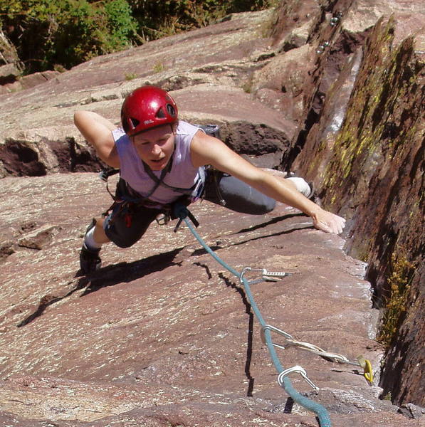 Christa Cline chalking up at a rest.