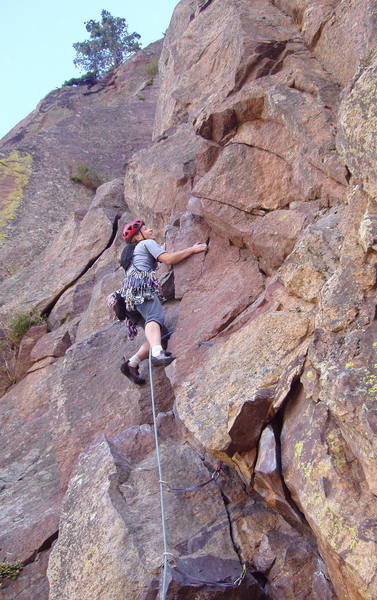 Christa Cline on the fourth pitch traverse. A key sidepull for the right hand makes this move easier.