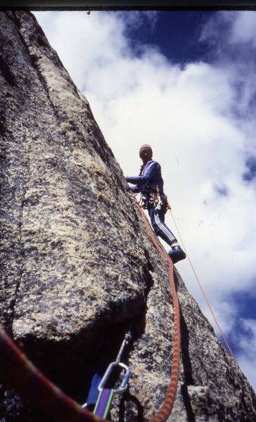 Leading the crux moves on the Barb.