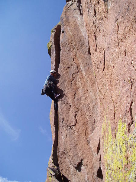Chuck Graves at the 10c crux. A few more feet and you can get inside, and it eases to 5.9.