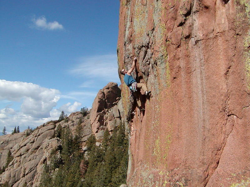 Nate Adams cruxing on Meanwhile, photo by Tod Anderson.