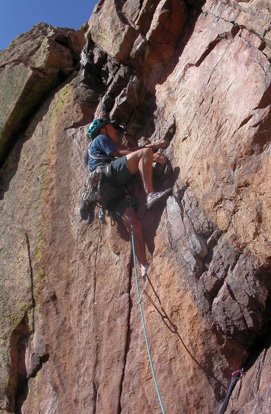 Ron Olsen powering up to the only rest on the steep "rotten band" pitch on upper T2.
