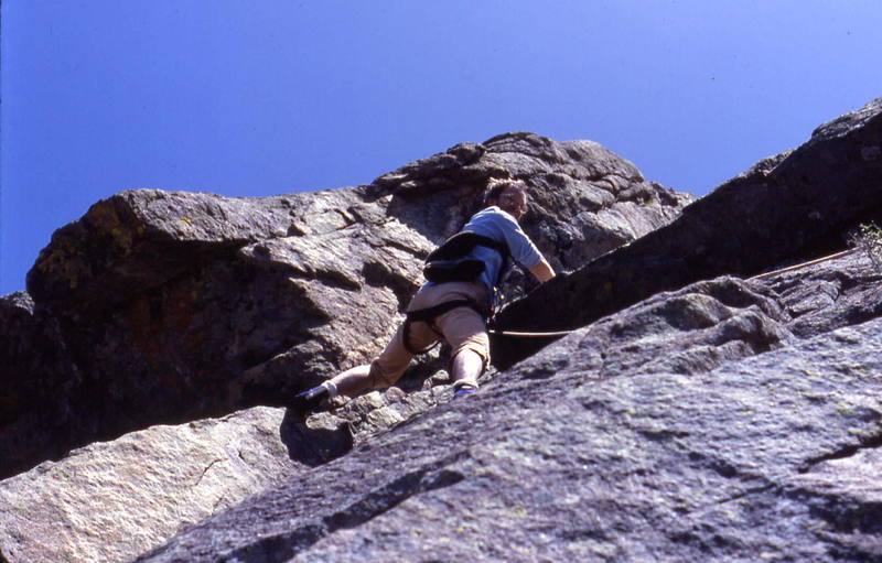 Passing the small overhang to get into the right facing dihedral on pitch 2.