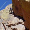 Roger Poage at the crux on the Rover dihedral.