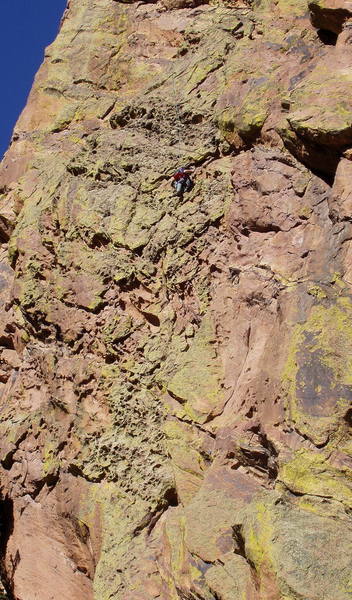 Roger Poage on the pocketed wall of Body Tremors. Photo taken from the top of lower Ruper.