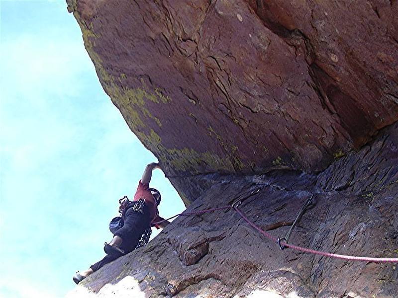 Kevin Currigan just past the crux on pitch 3. Photo by Hill Slothower on October 29th 2003. The second nut is a bomber.