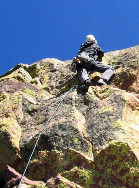 Ivan Rezucha heads into the 5.9. The bolted crux is in the lower half of the photo