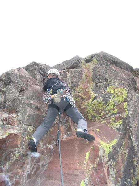 Ivan Rezucha where the climbing starts to get serious (start of Rossiter's P2). Cruxy moves continue beyond the skyline of this shot.