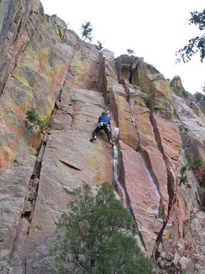Photo by Kris Thompson<br>
<br>
Just after the hardest single crux, but with <br>
some tricky climbing and pro still to go. This <br>
photo shows almost the entire route, bottom <br>
to top.