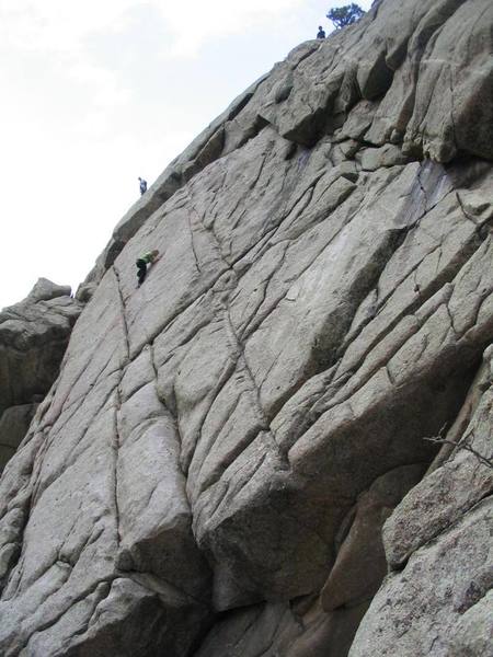 Manda watches the crack peter out as another climber that just finished the Cozyhang dihedral contemplates suicide.