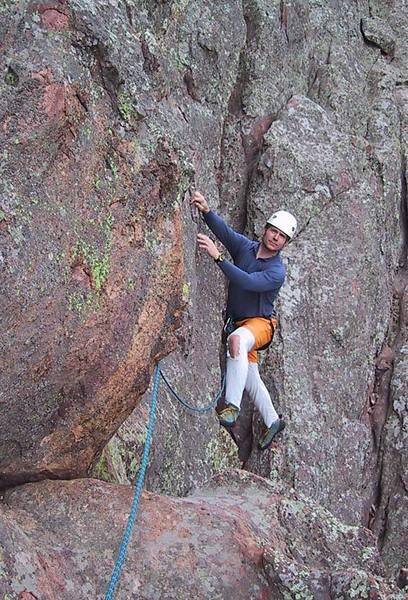 Mark is just about to start the crux moves in the pitch after the crow's nest. The piton is about 3 feet up and right of his right hand. The hold his right hand is on is the key to the easiest way to climb this section (for me).