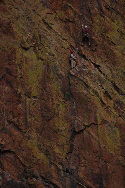 Unknown climbers on the second pitch.  Shot taken from the Fowler Trail across the canyon.