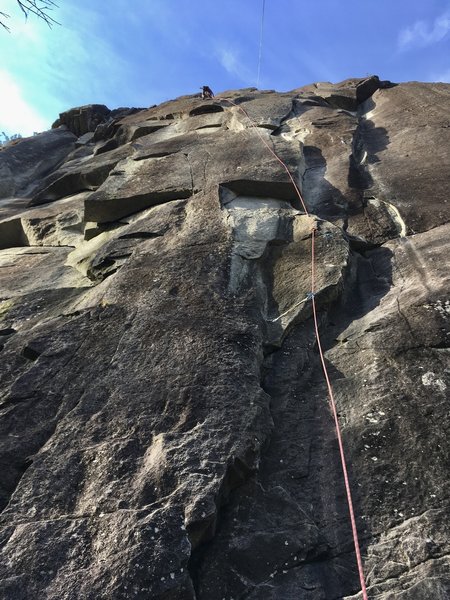 Michael Telstad pulling onto jugs after the crux of the pitch one extension