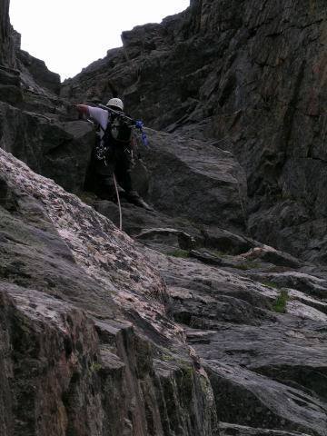 Photo by Avery N.<br>
<br>
The first bit of rock. The chimney drops off to the right. July 3rd, 2004.