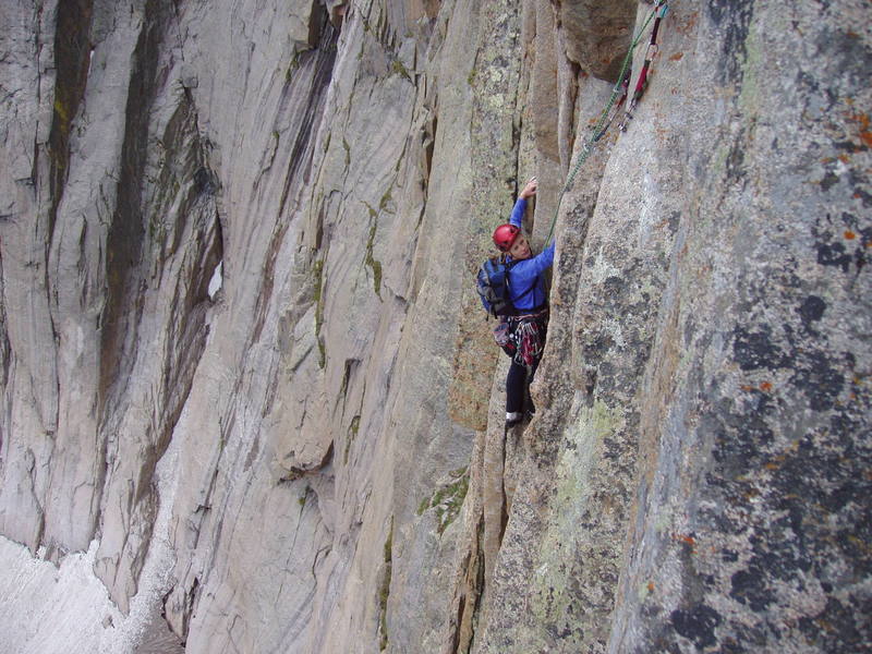 Approaching the crux undercling on pitch 4.
