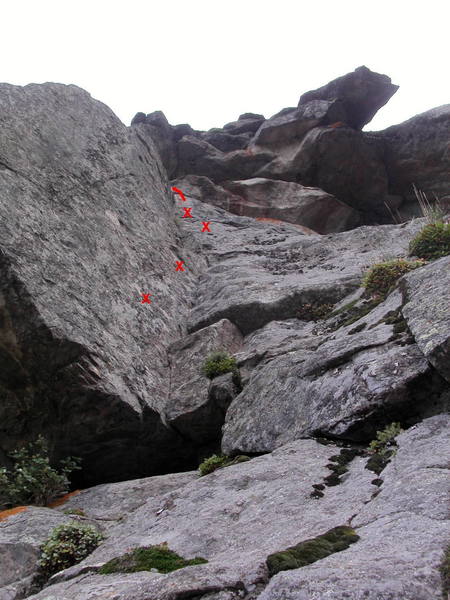 The last pitch of Lost Highway viewed from the belay. Thin stemming up the corner, with the 10c crux at the top two bolts in the photo. Above the corner, traverse left on a 5.8 friction slab, then up to the top.