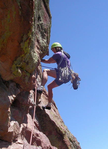 Jean starting the crux layback on the last pitch.