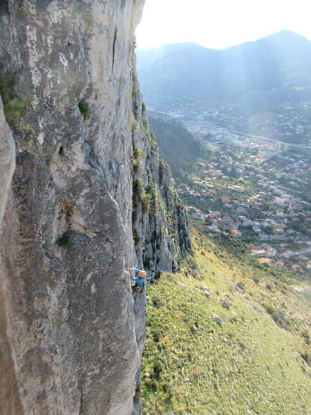 Martin Heiss is climbing in lower part of Via"Eretici"