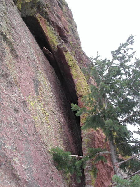 Sick Flake. The 5.8 crux is surmounting the chockstone at the top of the chimney, and laybacking the flake above.