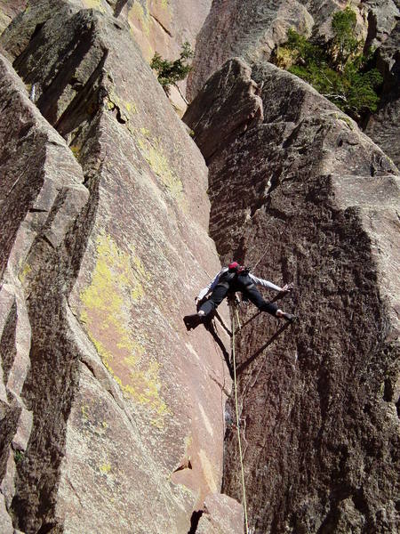 Butt shot with interesting shadows. Luke is mantling the good edge on the left wall. When your foot gets to that edge, you're done with the first crux.